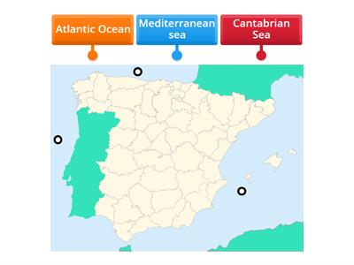 WHICH SEAS SURROUND SPAIN?